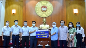 Cán bộ công nhân viên EVNNPT đóng góp 3 tỉ đồng ủng hộ Quỹ vắc-xin phòng chống COVID-19 Cán bộ công nhân viên EVNNPT đóng góp 3 tỉ đồng ủng hộ Quỹ vắc-xin phòng chống COVID-19